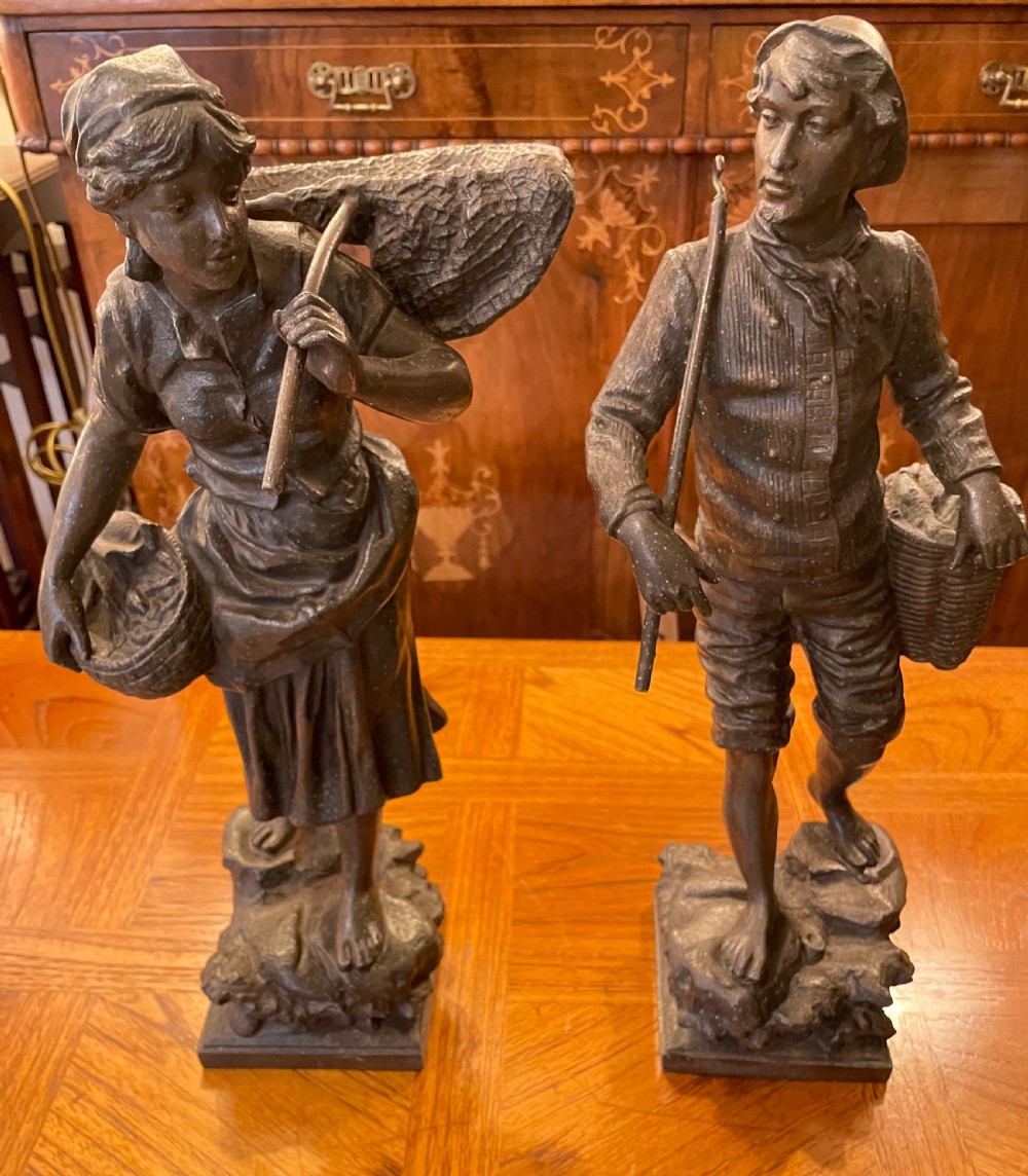 Late 19thc pair spelter fisherfolk, signed E Rousseau
