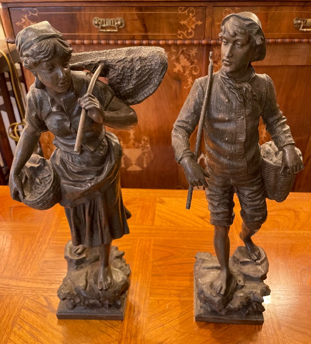 Late 19thc pair spelter fisherfolk, signed E Rousseau View II