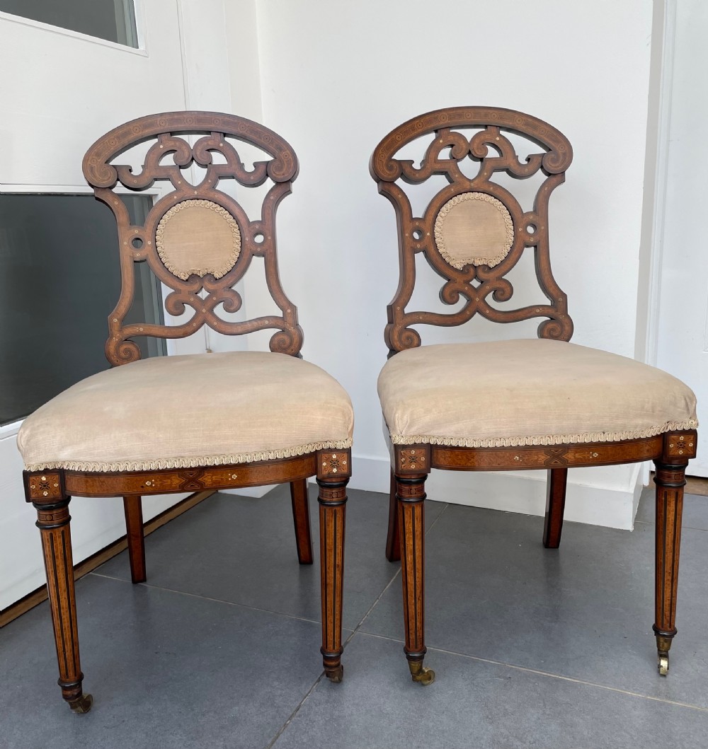 Pair Victorian Aesthetic Movement walnut and burr maple salon chairs c1870