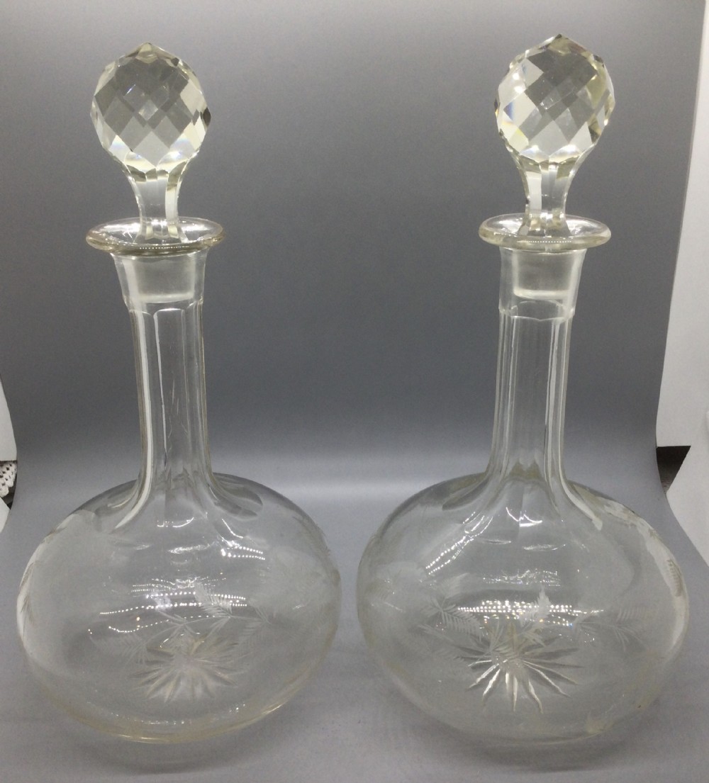 Mid Victorian pair of engraved and cut lead crystal decanters c1870