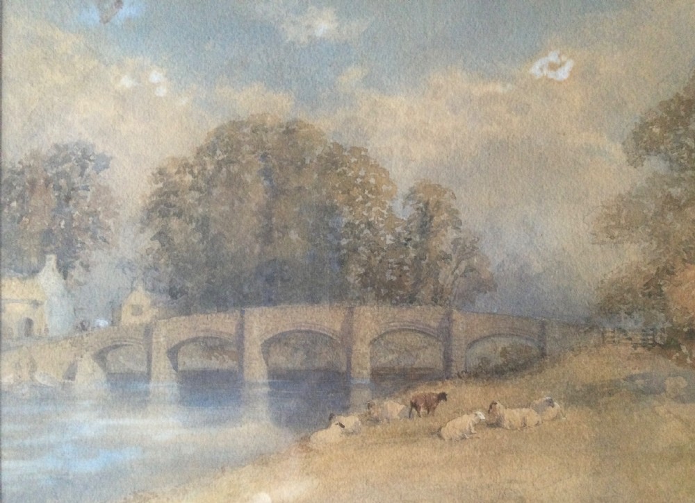 A pair of framed 19th-century watercolour paintings depicting English countryside scenes with stone buildings, bridges, and livestock set in gilt frames. View XIV