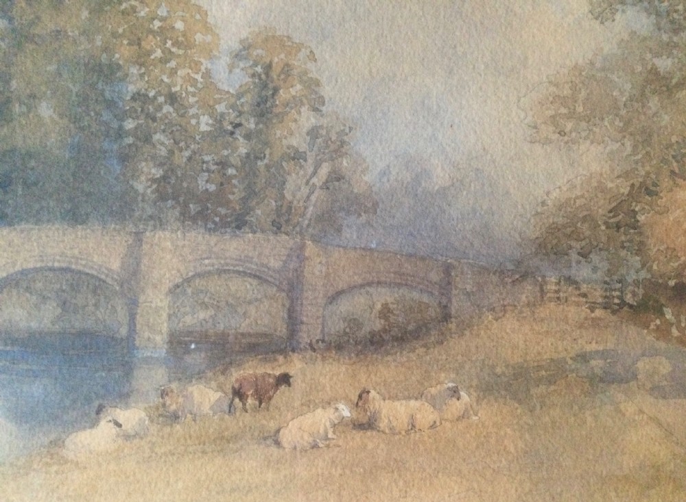 A pair of framed 19th-century watercolour paintings depicting English countryside scenes with stone buildings, bridges, and livestock set in gilt frames. View XV