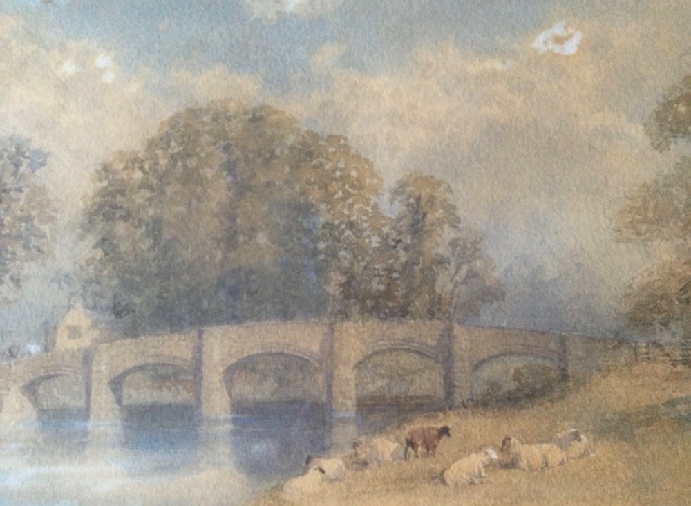 A pair of framed 19th-century watercolour paintings depicting English countryside scenes with stone buildings, bridges, and livestock set in gilt frames. View XVII