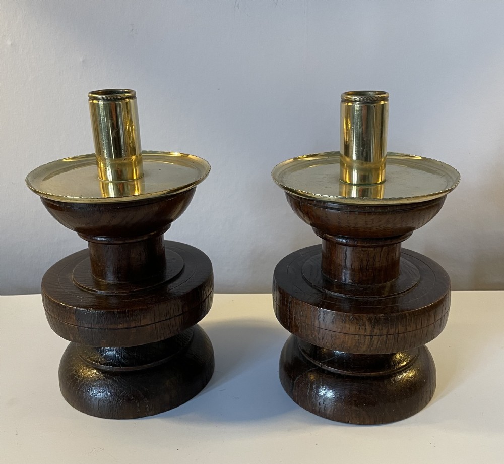 Pair Arts & Crafts oak and brass candlesticks c1870