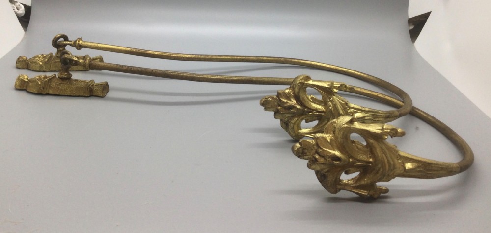 Late 19thC French ormolu curtain supports tie backs c1880