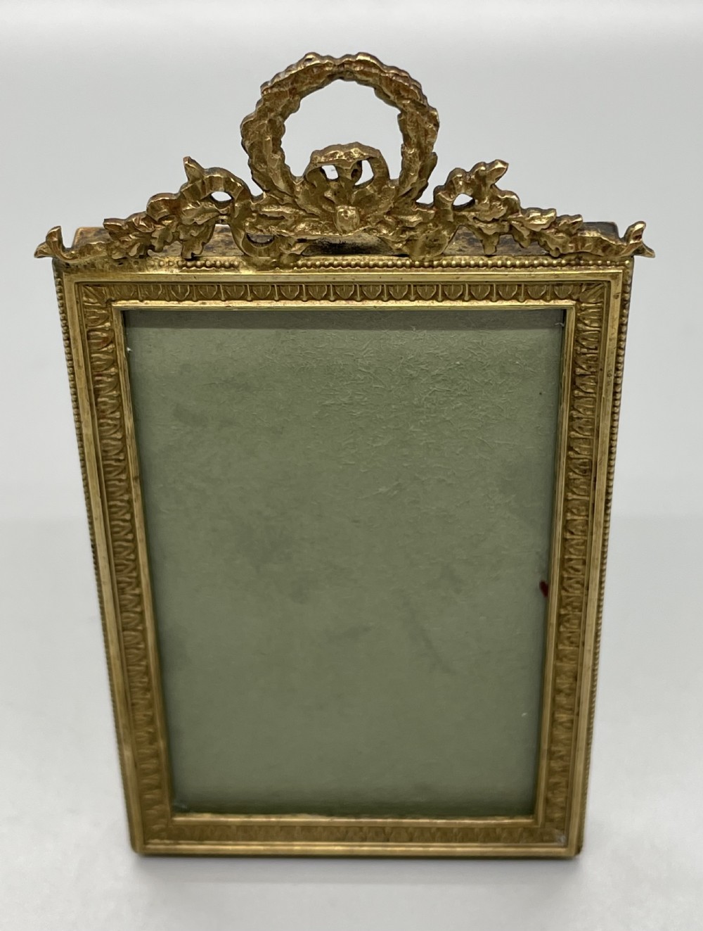Late 19thc French petite ormolu photo frame c1880