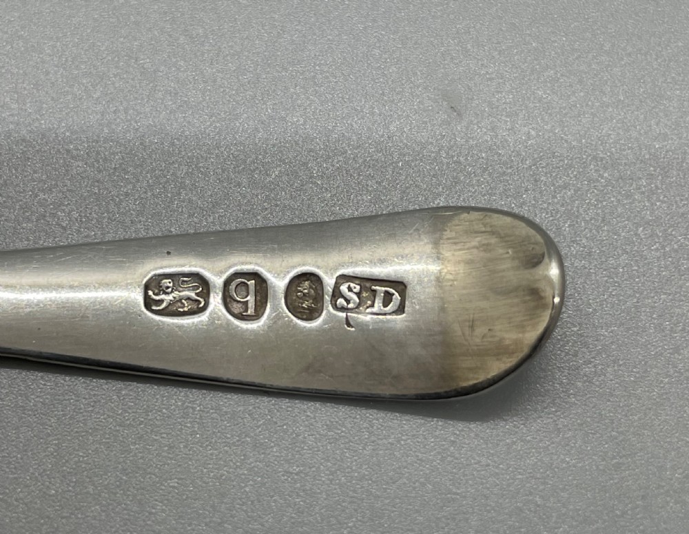 A set of six 18th-century George III sterling silver teaspoons with bright-cut lattice engraving along the handles. View VII