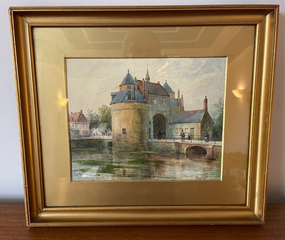 A framed Edwardian watercolour painting depicting the historic Porte dOstende gate and bridge in Bruges rendered in muted tones. View II