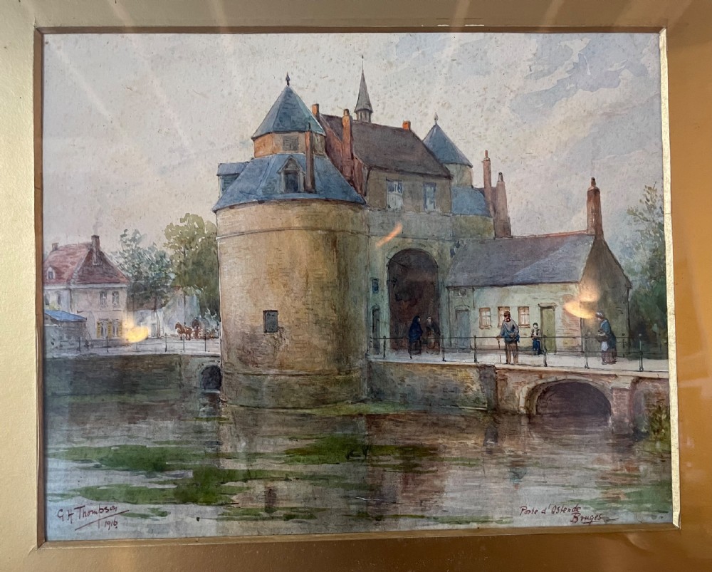 A framed Edwardian watercolour painting depicting the historic Porte dOstende gate and bridge in Bruges rendered in muted tones. View III