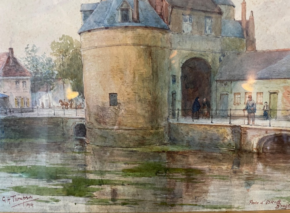A framed Edwardian watercolour painting depicting the historic Porte dOstende gate and bridge in Bruges rendered in muted tones. View X