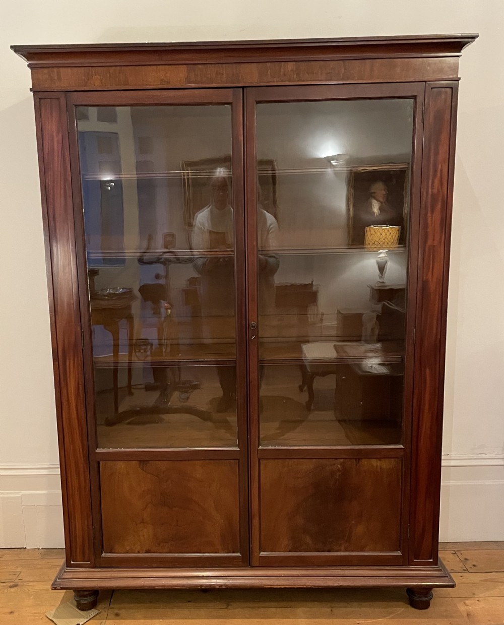 Early Victorian mahogany glazed bookcase cupboard c1860