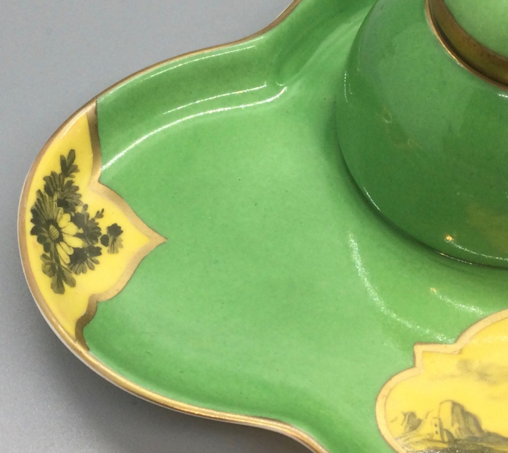 An early 19th-century green and yellow porcelain inkstand featuring a central dome inkwell and hand-painted landscape reserves on a shaped tray. View VII