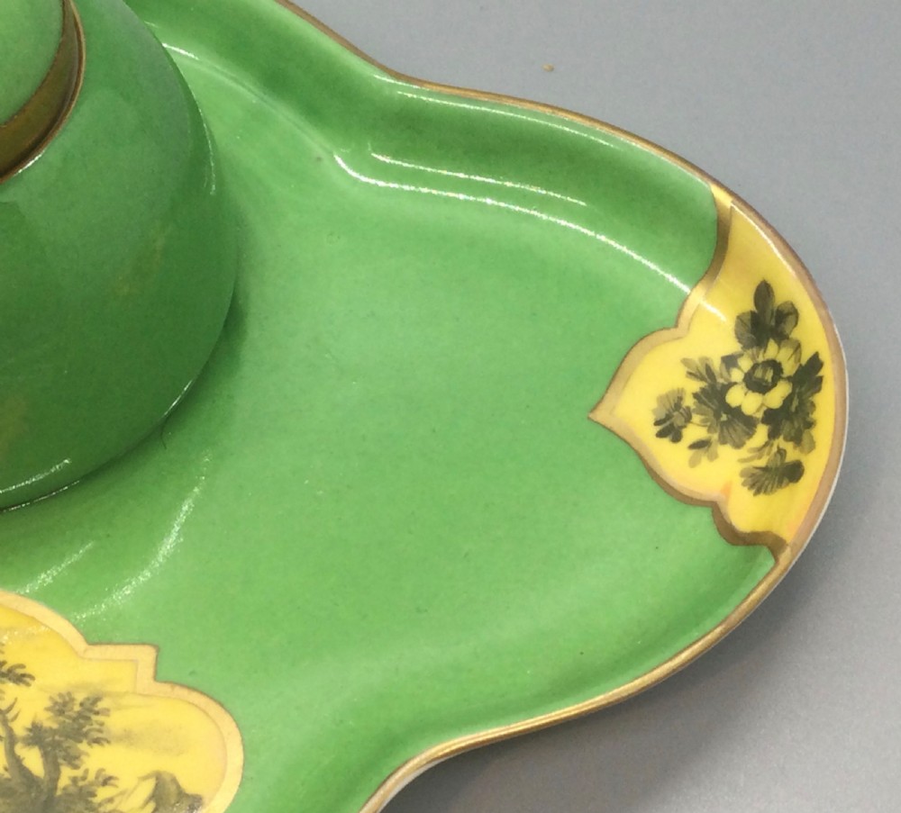 An early 19th-century green and yellow porcelain inkstand featuring a central dome inkwell and hand-painted landscape reserves on a shaped tray. View VIII