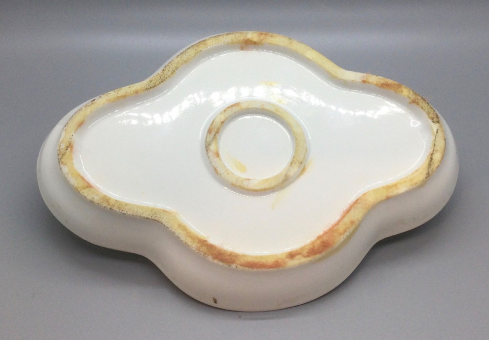 An early 19th-century green and yellow porcelain inkstand featuring a central dome inkwell and hand-painted landscape reserves on a shaped tray. View XI