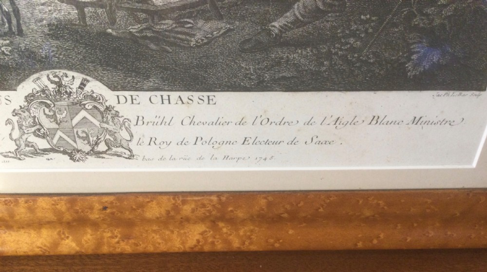 An 18th-century French monochrome engraving depicting figures and horses in a rural landscape, housed within a burr wood frame. View V
