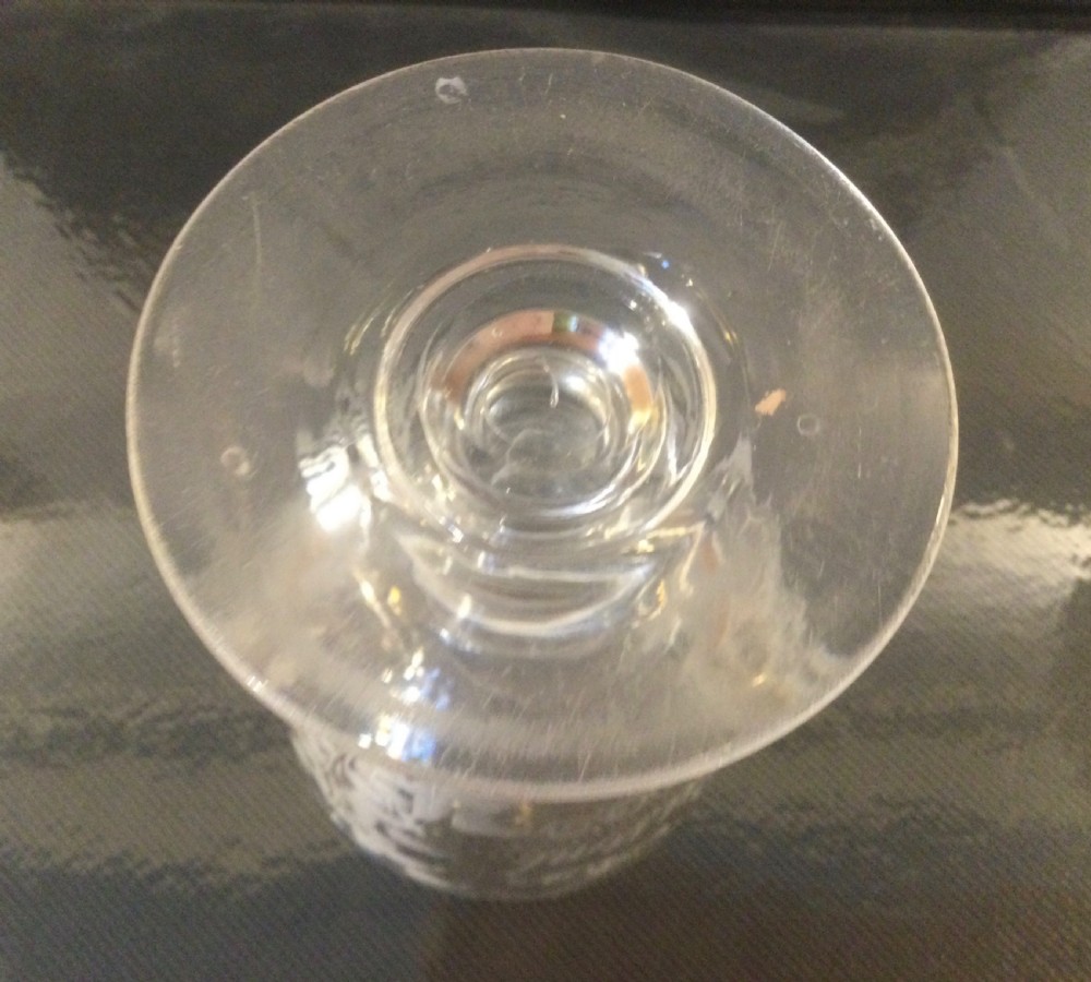A clear Victorian glass rummer featuring hand-engraved botanical detailing and lettering on a short footed stem. View VIII