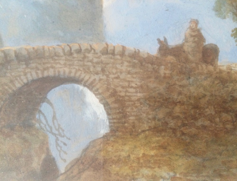A 19th-century framed watercolour landscape painting featuring a stone arch bridge, trees, and distant mountains. View VIII