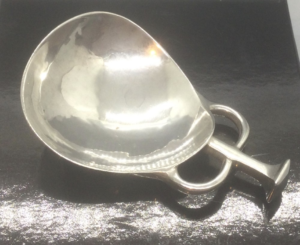 Arts & Crafts style silver caddy spoon by AE Jones 1929
