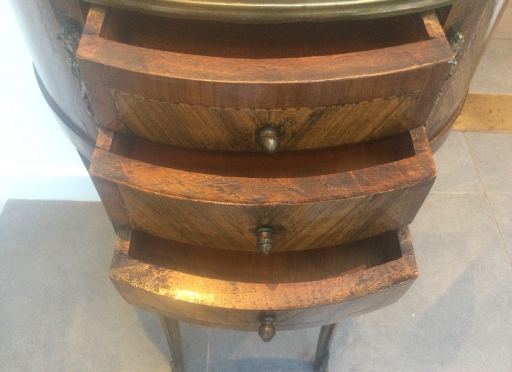 A late 19th-century French kingwood demi-lune console table featuring three drawers with geometric parquetry veneer, brass mounts, and long cabriole legs. View VIII