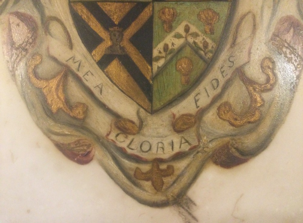 A diamond-shaped gilded frame housing a 19th-century oil painting on glass of an armorial crest with a lion, shield, and Latin motto banner. View IX