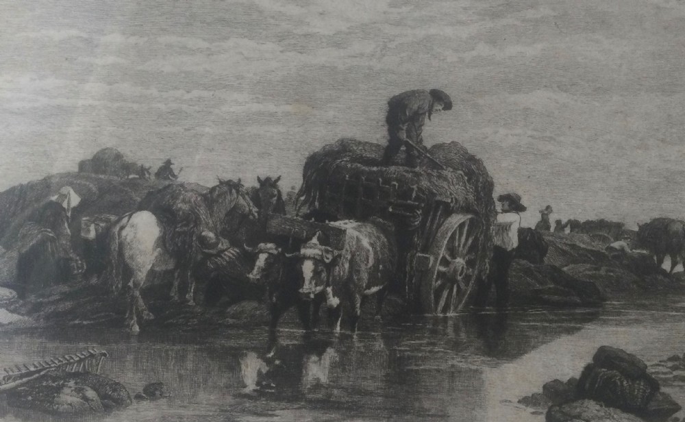 A framed nineteenth-century monochrome etching depicting figures and horse-drawn carts gathering seaweed on the Guernsey coastline. View VII