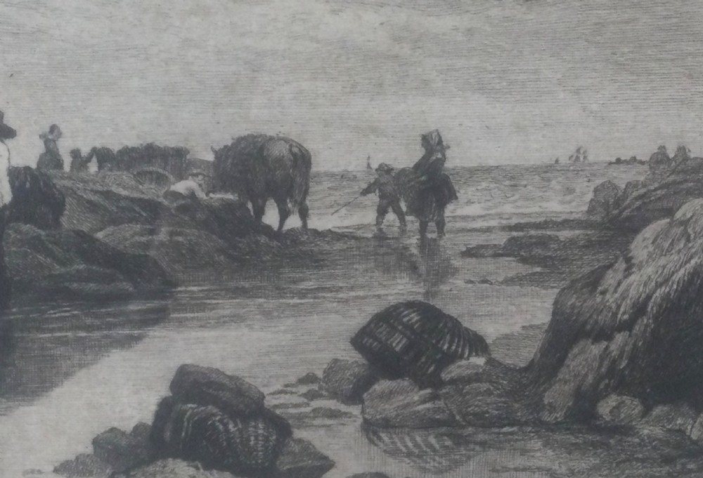 A framed nineteenth-century monochrome etching depicting figures and horse-drawn carts gathering seaweed on the Guernsey coastline. View IX