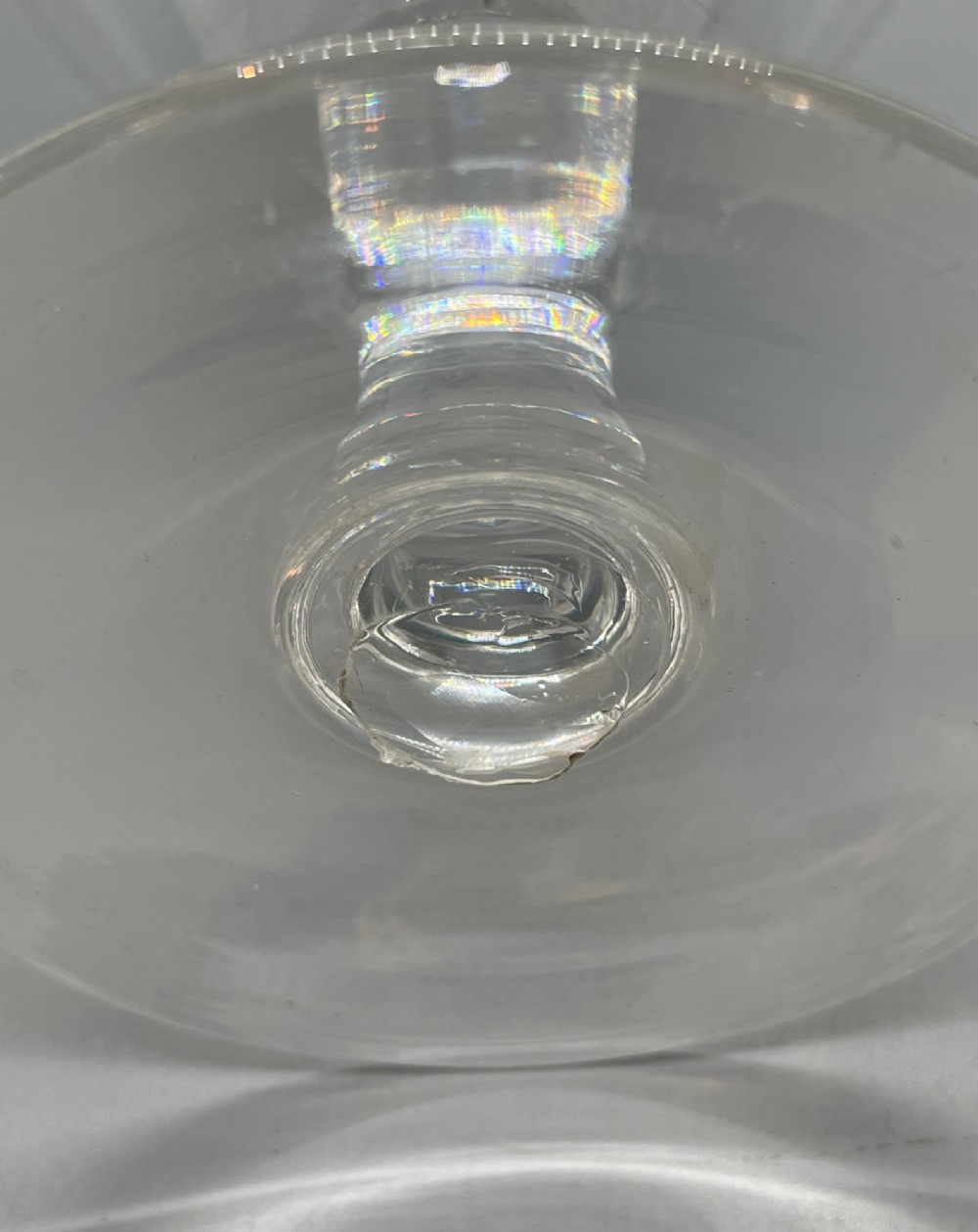 A matched pair of clear Georgian glass rummers featuring ogee-shaped bowls, short stems, and circular flat feet. View X