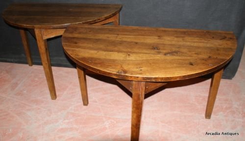 French Walnut Demi Lune Consoles.