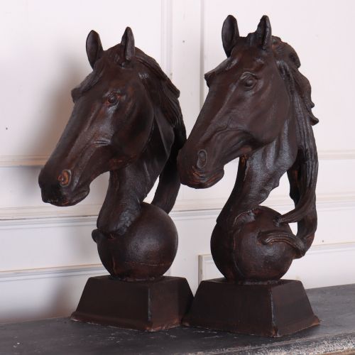 PAIR OF CAST IRON HORSEHEADS