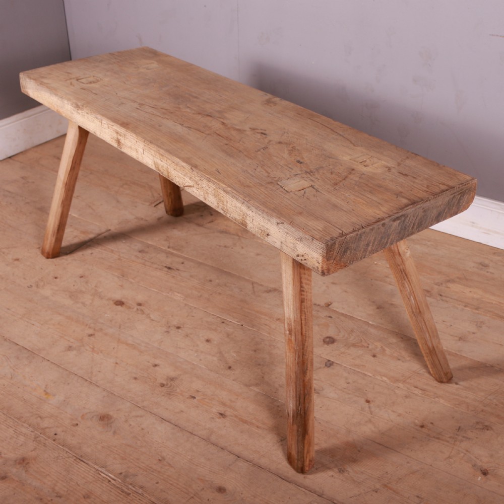 A rectangular wooden trestle table crafted from pale scrubbed timber with four angled splayed legs. View II