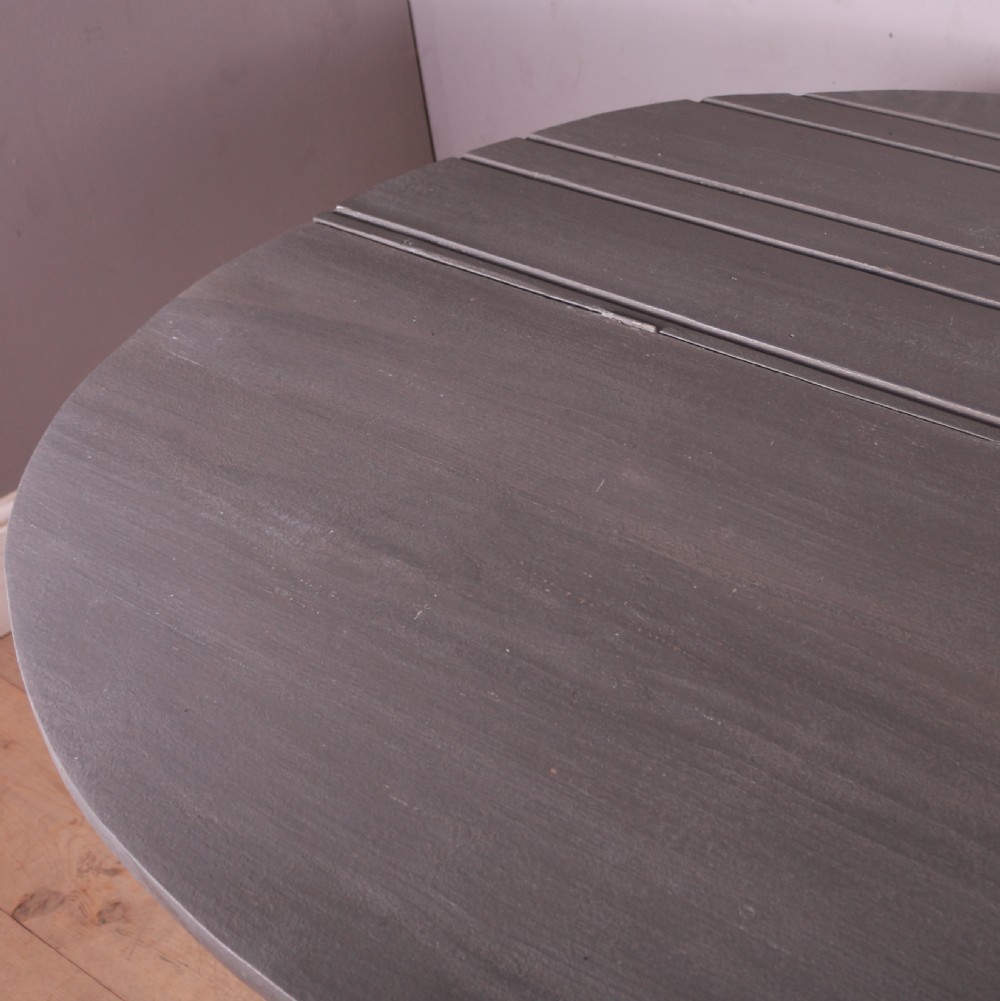 A semi-circular painted Dutch console table with a grey top, off-white apron, turned legs, and a lower stretcher base. View VI