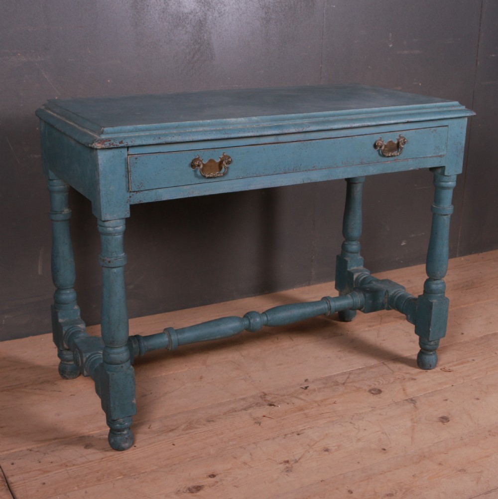 A blue painted side table featuring a single drawer with two brass handles, turned legs, and lower stretchers. View II