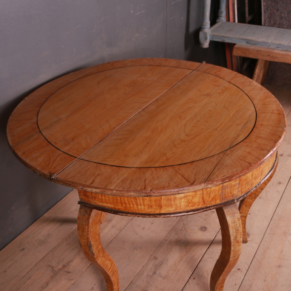 A semi-circular Swedish wooden console table featuring four slender cabriole legs, a fifth gateleg, and a flip-top surface. View VI