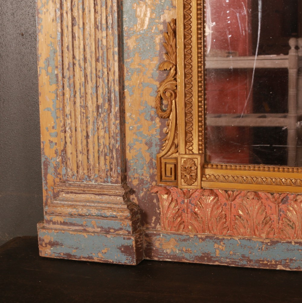 A large rectangular antique French mirror with fluted pilasters, carved gilded leaf mouldings, distressed duck egg blue paintwork, and a foxed glass plate. View II