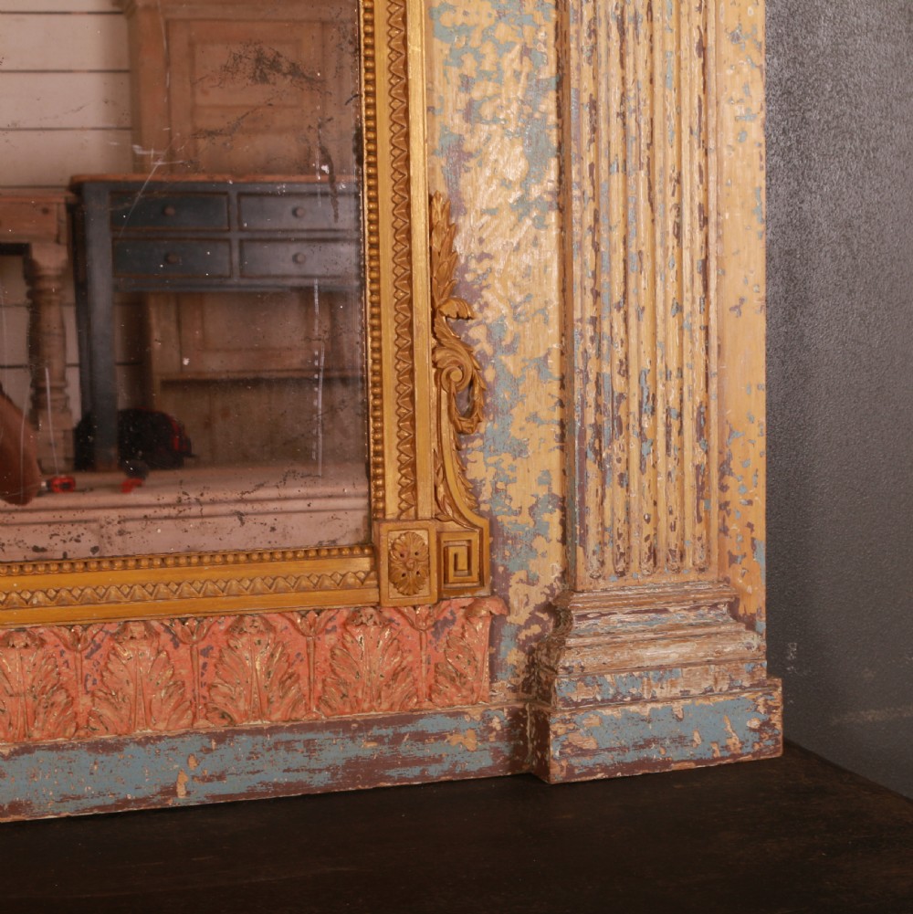 A large rectangular antique French mirror with fluted pilasters, carved gilded leaf mouldings, distressed duck egg blue paintwork, and a foxed glass plate. View III