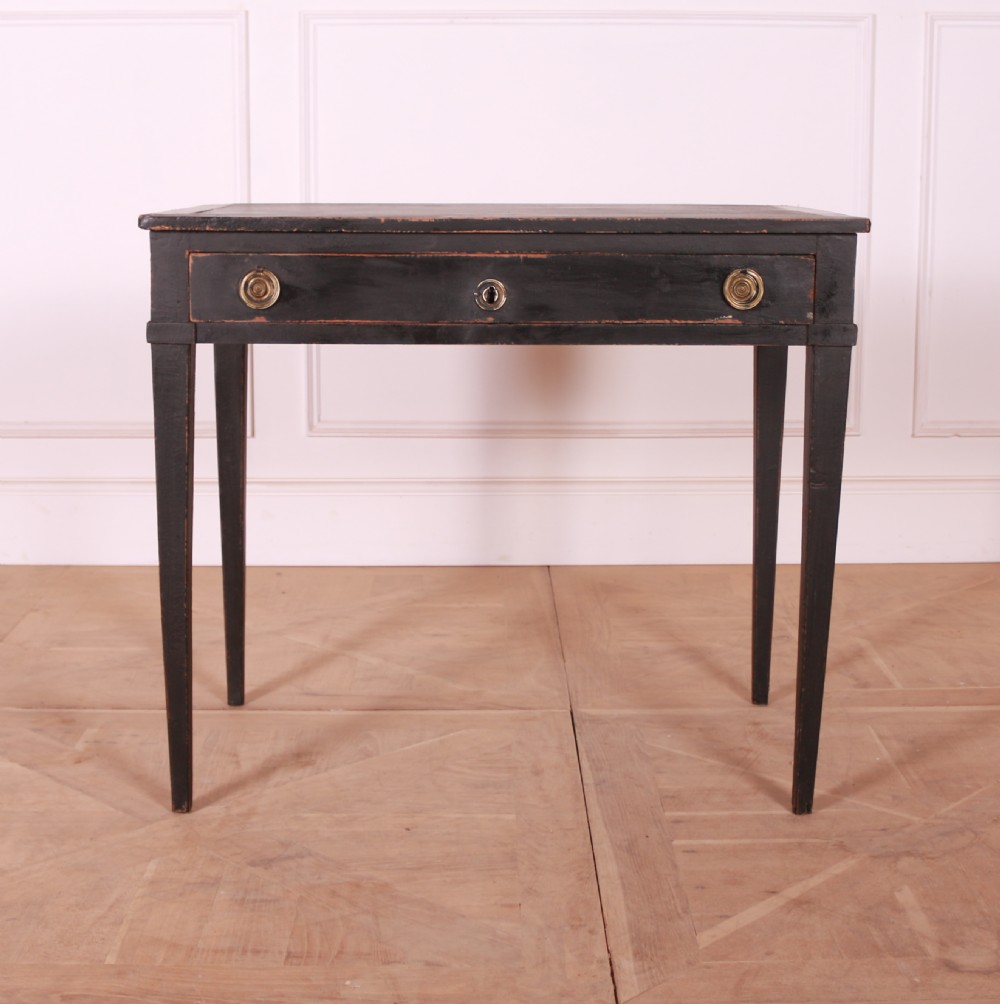 A rectangular black painted French side table featuring a single frieze drawer, brass handles, and square tapered legs. View II