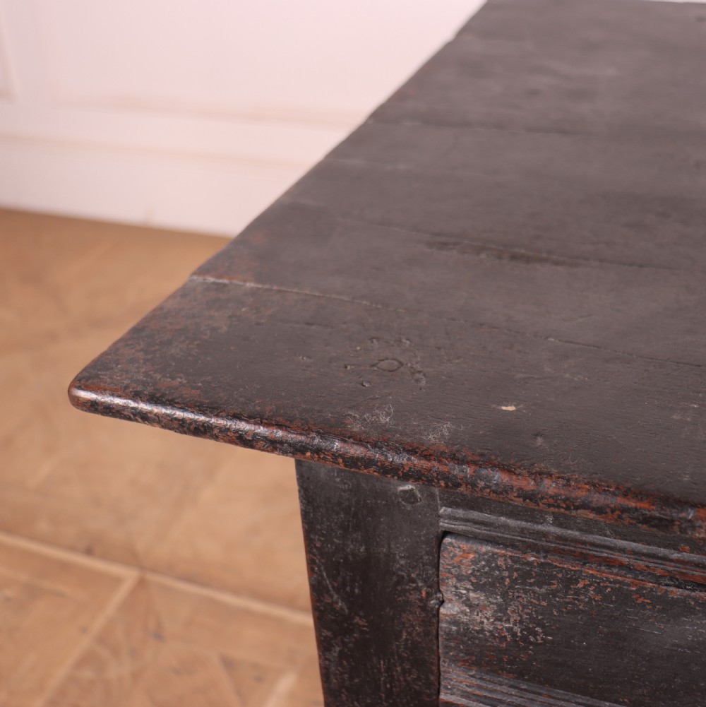 An 18th-century dark painted wooden side table with a single drawer, turned legs, and low box stretchers. View VIII
