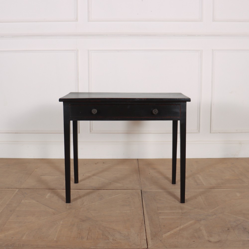 A dark painted rectangular wooden lamp table featuring a single frieze drawer with two circular metal knobs and four square legs.