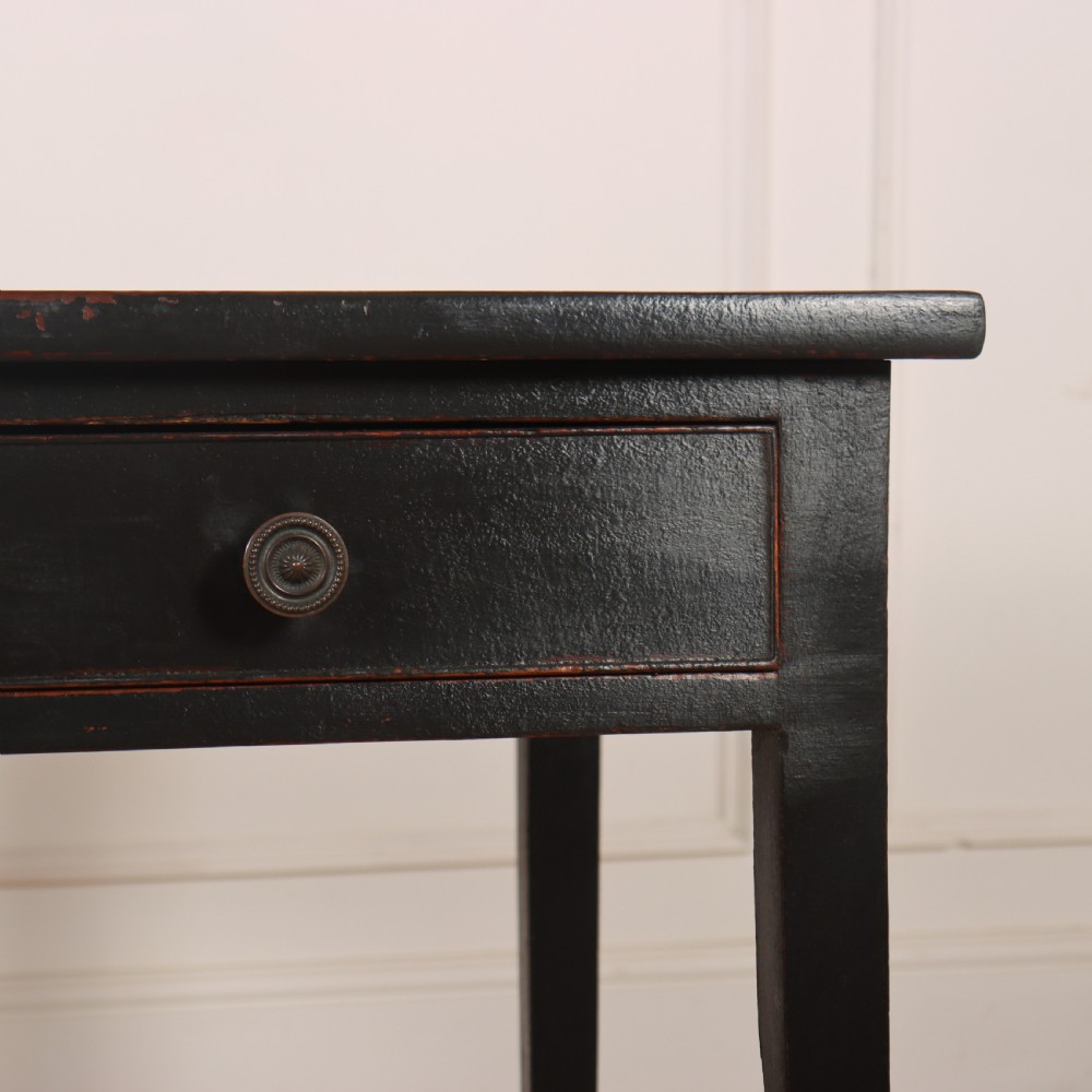 A dark painted rectangular wooden lamp table featuring a single frieze drawer with two circular metal knobs and four square legs. View III