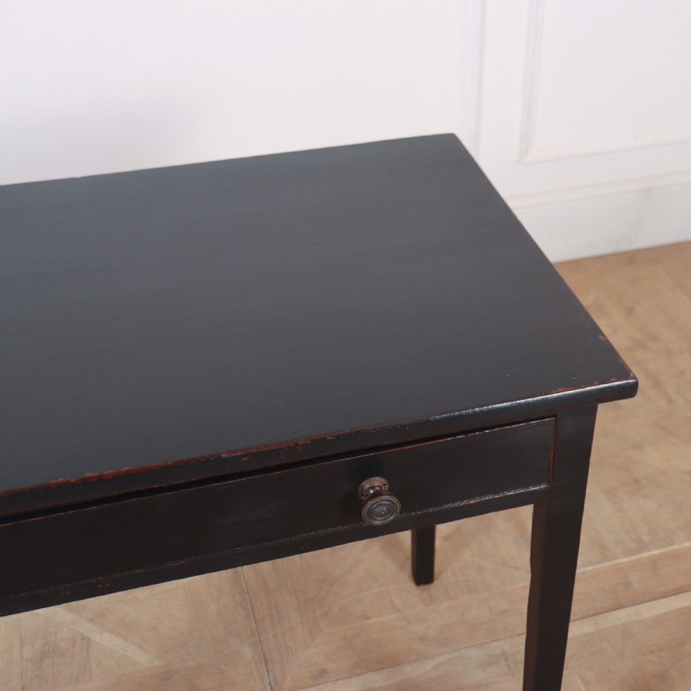 A dark painted rectangular wooden lamp table featuring a single frieze drawer with two circular metal knobs and four square legs. View IV