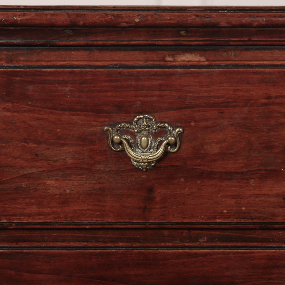 An 18th-century Italian walnut commode with two drawers, raised on tapered square legs with decorative brass fittings. View IV