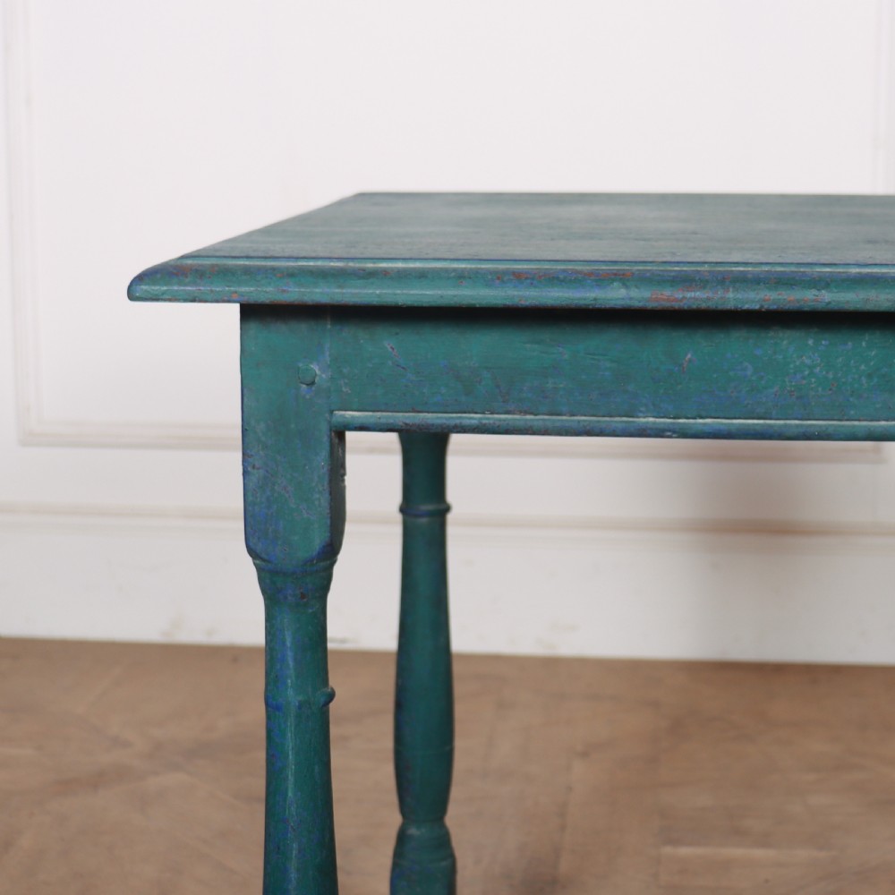 An 18th-century rectangular wooden side table featuring turned legs, box stretchers, and a distressed teal green painted finish. View II