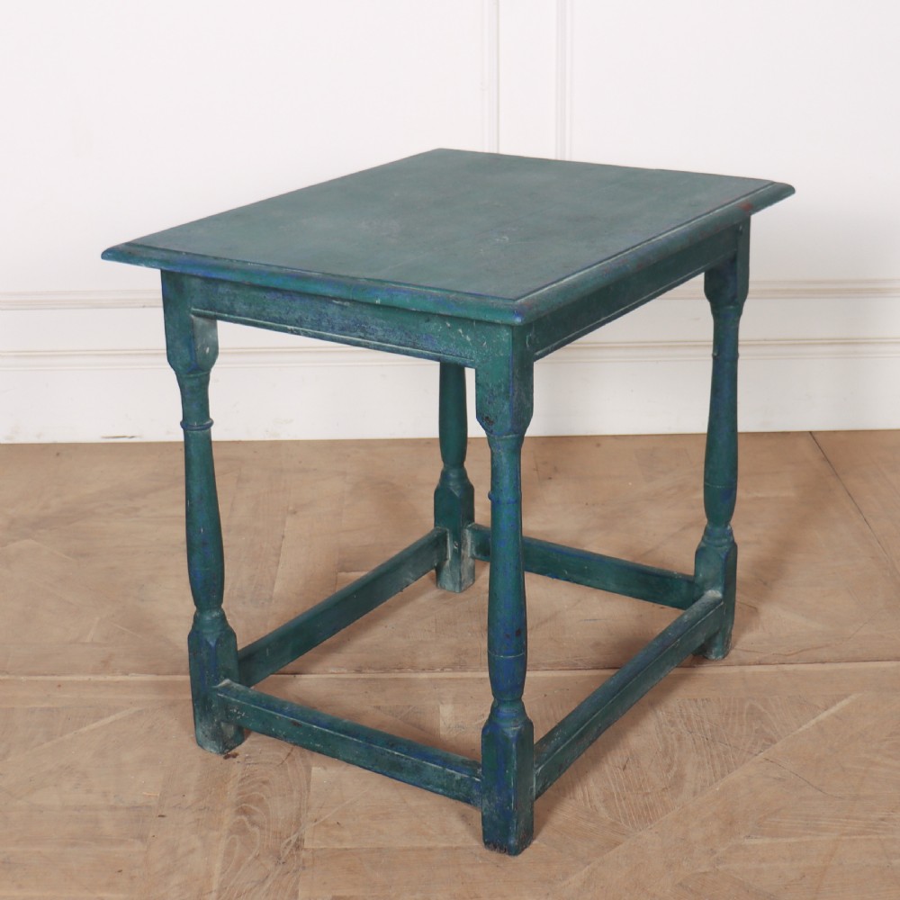 An 18th-century rectangular wooden side table featuring turned legs, box stretchers, and a distressed teal green painted finish. View V