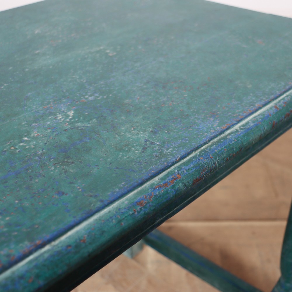 An 18th-century rectangular wooden side table featuring turned legs, box stretchers, and a distressed teal green painted finish. View VI