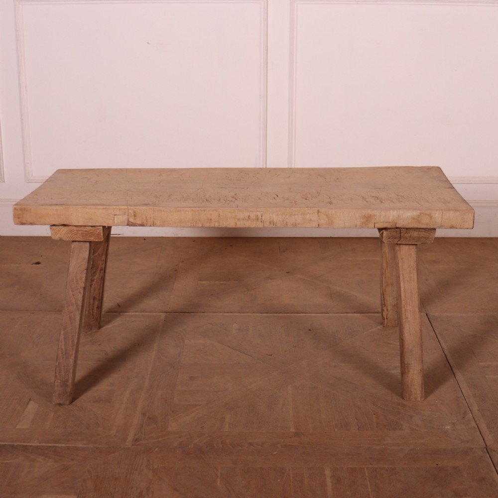 A French rustic trestle table made from scrubbed sycamore and elm with angled splayed legs and a thick rectangular wooden top. View II