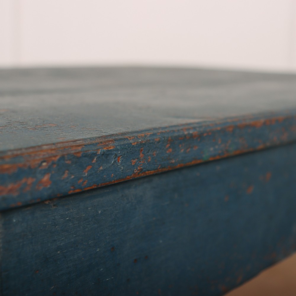 An 18th-century rectangular wooden side table featuring turned legs, a low box stretcher, and a distressed blue painted finish. View III