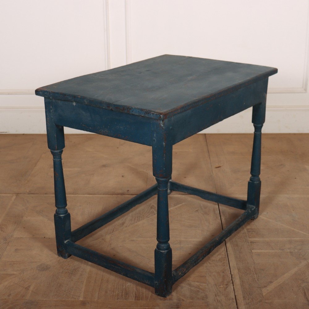 An 18th-century rectangular wooden side table featuring turned legs, a low box stretcher, and a distressed blue painted finish. View VII