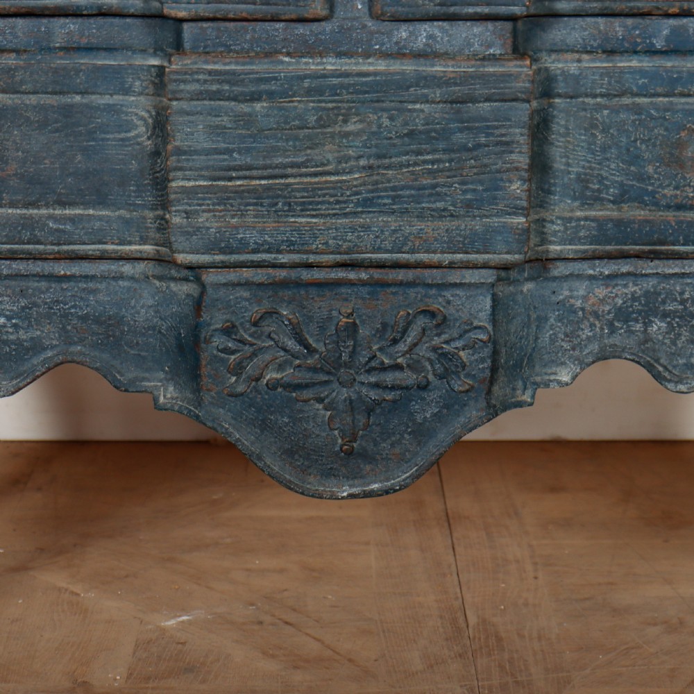 An 18th-century Portuguese serpentine commode featuring a blue painted finish, cabriole legs, and a carved apron. View II