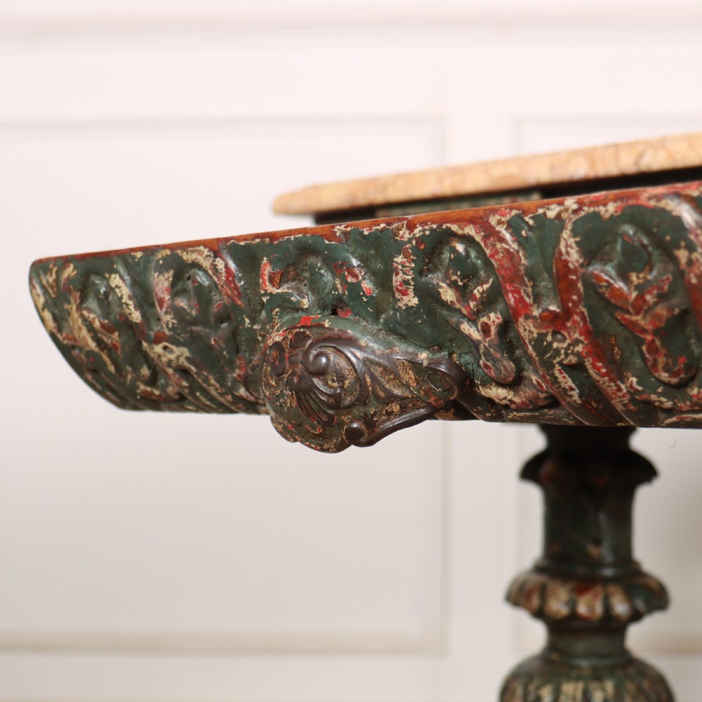 A French pastry table featuring a polished light pink marble top supported by a carved distressed green painted wood base with an undertier shelf. View VIII