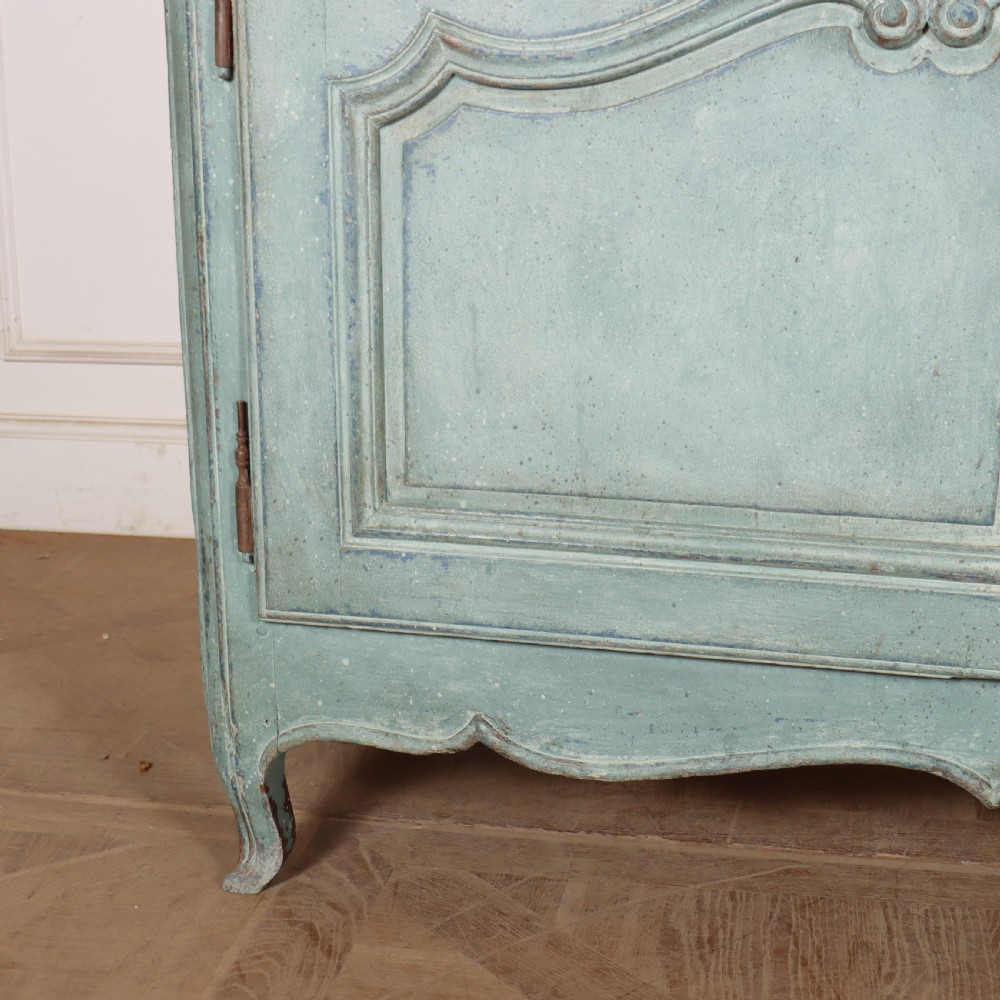 A 19th-century French provincial painted wooden buffet with three drawers above two carved panel doors in a distressed soft blue finish. View III